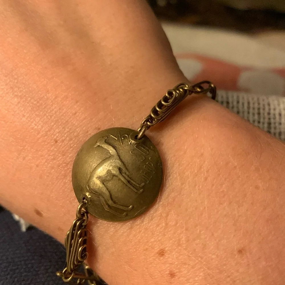Vintage Gold Tone Peruvian 1/2 Sol De Oro Llama Coin Bracelet 1967 with clasp